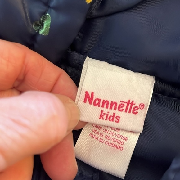 Nannette Kids sleeveless quilted puffer vest. Navy blue with shiny hearts. Size4 - Picture 7 of 8